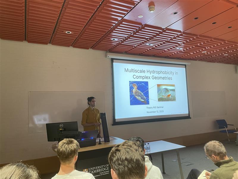 Image of Alex presenting the talk
